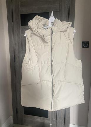 Утеплена жилетка