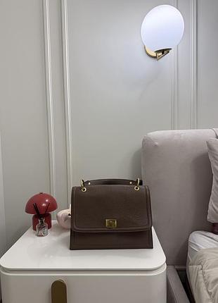 Шкіряна сумка бежевого коричневого кольору