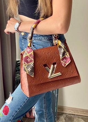 Коричнева жіноча сумочка