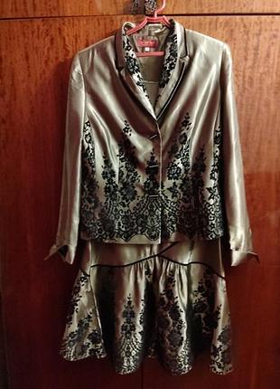 Шикарний вечірній костюм.нюанс.