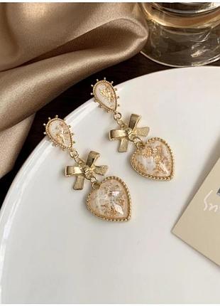 Жіночі довгі сережки підвіски сердечко серце золотисті кульчики золоті серьги