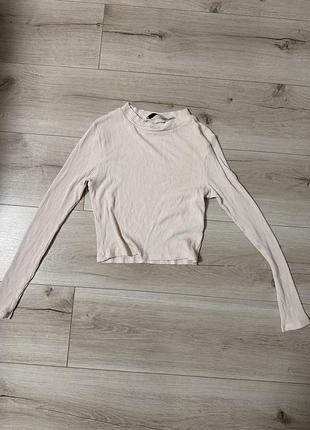 Жіночий топ на довгий рукав у рубчик