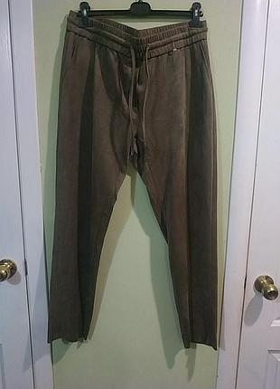 Плотные ,классные на резинке с карманами,тепленькие брючки. norah.