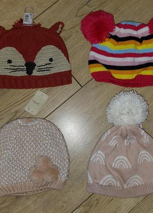 Фірмові шапочки next для дівчаток