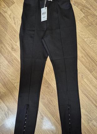 Продам теплые новые брюки