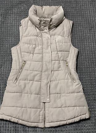 Дуже тепла жилетка next