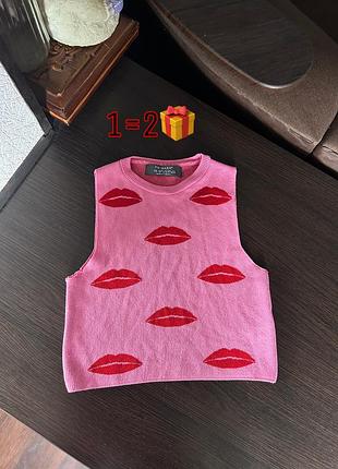 Женская жилетка