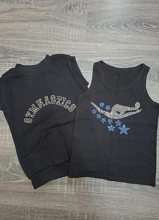 Желетка утеплена та майка для гімнастики чорна зі стразами.