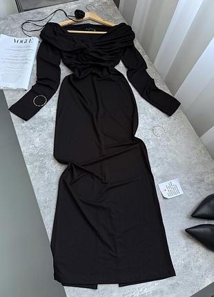 Чорна сукня міді