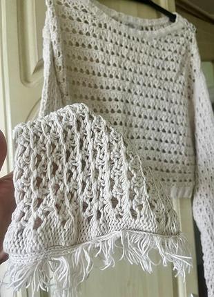 В’язана кофта з бахрамою
