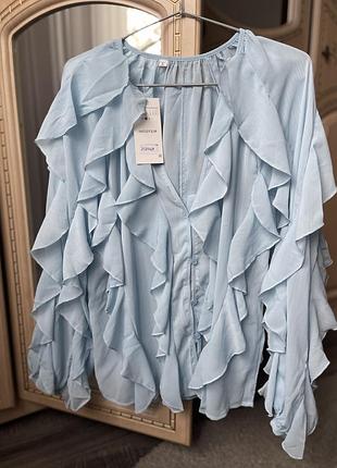 Блуза з воланами