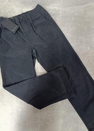 Брюки на мальчика 122 см черные премиальная коллекция от c&amp;a