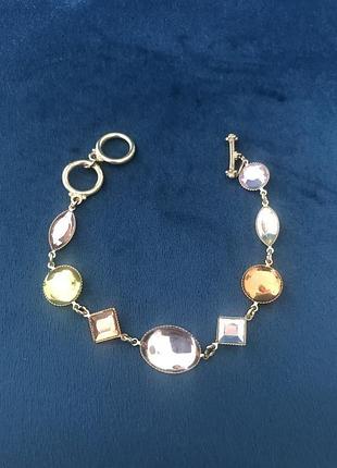 Новий браслет з різнокольоровими камінцями avon