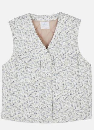 Стьобана жилетка з квітами