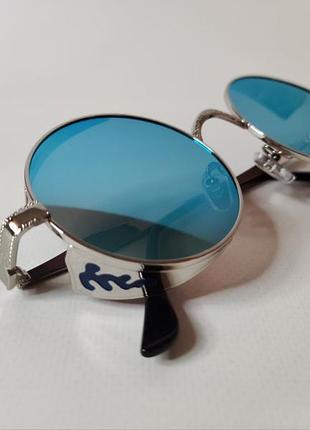 Круглые солнцезащитные очки в винтажном стиле