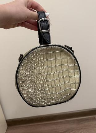 Форма кругла — тренд сезону, жіноча сумка з натуральної шкіри