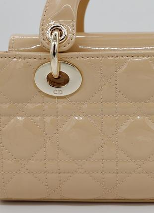 Шкіряна лакована сумка d-joy в фірмовій прострочці d 8
