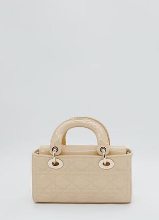 Шкіряна лакована сумка d-joy в фірмовій прострочці d 9