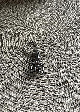 Металевий брелок