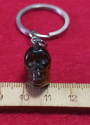 Брелок-череп тигровый глаз.