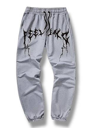 Спортивні штани сірі з принтом