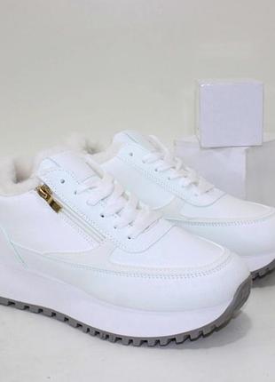 Білі зимові кросівки з блискавкою