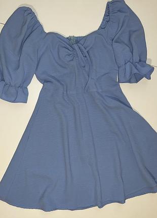 Ніжна блакитна сукня з об’ємними рукавами