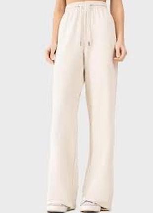 Штани спортивні,світло сірий колір., широкі.