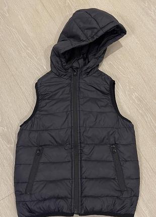 Пухова жилетка