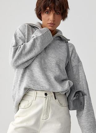 Однотонний в'язаний светр оверсайз із широкими рукавами