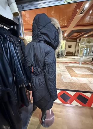 Жіночий плащ