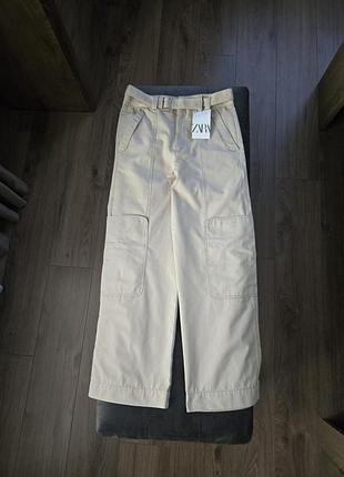Бежеві штани zara