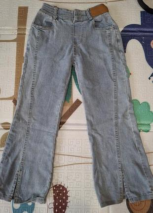 Джинсы с разрезом