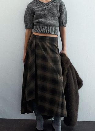 Клетчатая юбка средней длины