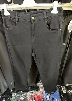 Жіночі чорні теплі джинси на байці