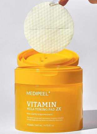 Пілінг-педи medipeel vitamin mela toning pad 2x з комплексом вітамінів. вирівнюють тон, м'яко полірують шкіру, роблять її свіжою, пружною та сяйливою.