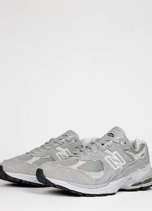 Кросівки нью беленс чоловічі сірі new balance 2002r protection pack light gray