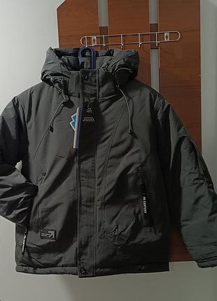 Зимова куртка 146, 152