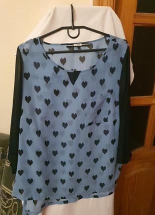 Блуза шифонова жіноча 3/4 рукав,чорно- блакитна, дуже гарна і оригінальна,зад довший  72см від переду- 65см,в грудях 59, плечі 40. елегантна дуже