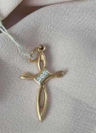 Золотий хрестик з фіанітами білого кольору.