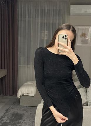 Жіночий чорний бодік з блискітками і відкритою спиною