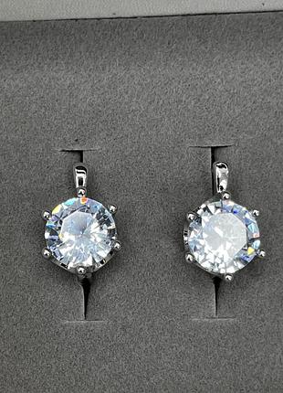 Сережки з великим каменем
