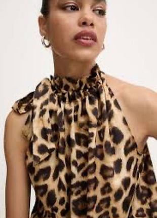 Стильна жіноча блуза з завʼязками на шиї