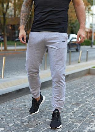 Штани чоловічі трикотажні nike світло-сірі