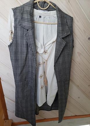 Жилетка в клетку