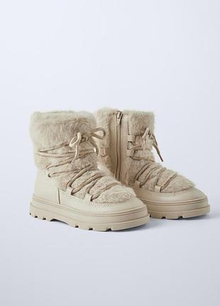 Зимові чоботи з хутром zara