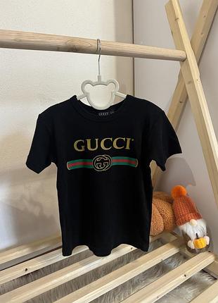 Футболка gucci 5-6 років є тріщинки на лого, букви цілі