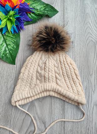 Шапка  на завязках з натуральним пумпоном