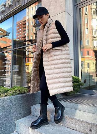 Удлинённая стеганная теплая жилетка