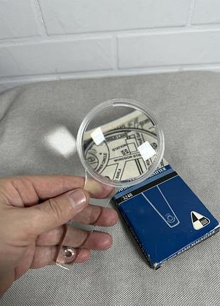 Ручна лупа 70 мм зроблена в англії пластик